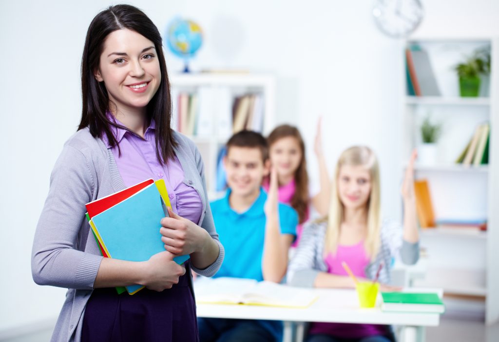 happy teacher with students background